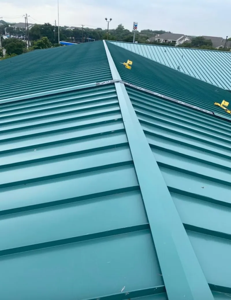 Green commercial metal roof ridge and valley for Metal Roof Repair in New Boston